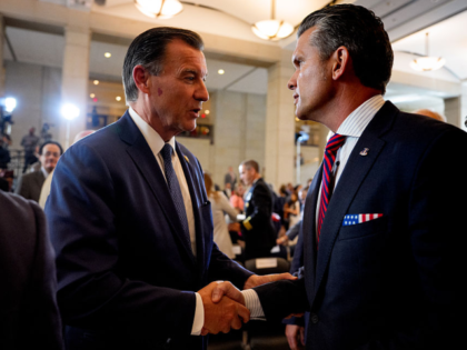 WASHINGTON, DC - SEPTEMBER 3: Rep. Tom Suozzi (D-NY) (L) and U.S. Defense Secretary Pete H