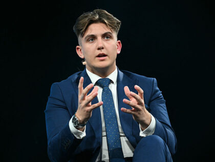 George Finch, leader of warwickshire county council smiles as he attends the first day of