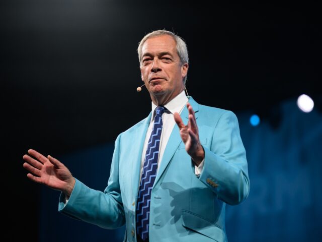 BIRMINGHAM, ENGLAND - SEPTEMBER 05: Leader of Reform UK Nigel Farage addresses delegates t