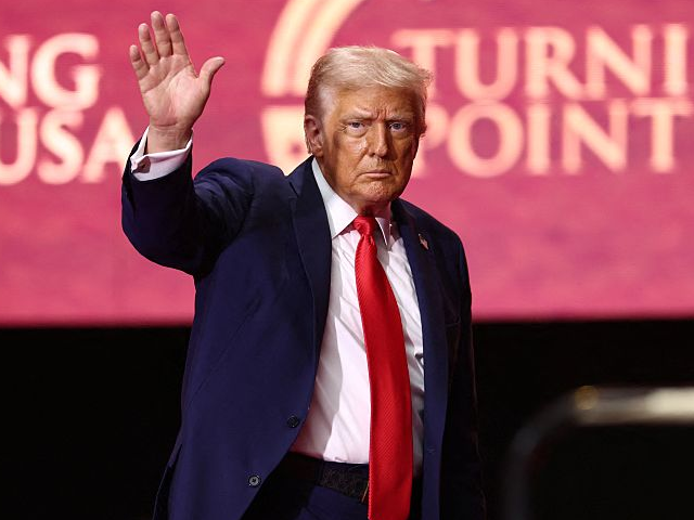 GettyImages-2236158766 US President Donald Trump reacts after speaking at the public memorial service for right-w