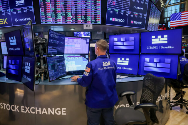 A trader works on the floor of the New York Stock Exchange (NYSE) in New York, US, on Mond