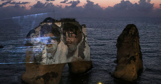 Lebanon Suspends Hezbollah-Linked NGO for Projecting Images of Terrorist Leaders on Iconic Ocean Landmark