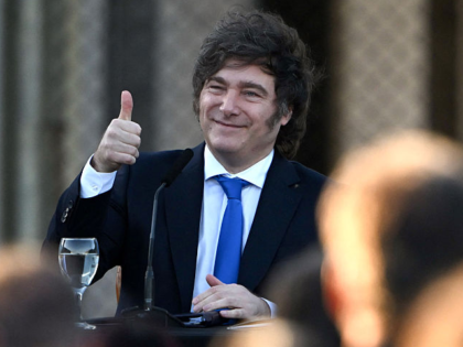 Argentina's President Javier Milei gives a thumb-ups during the official presentation of a