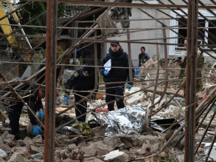 LVIV, UKRAINE - OCTOBER 5: Emergency services clear debris at the site of a private house