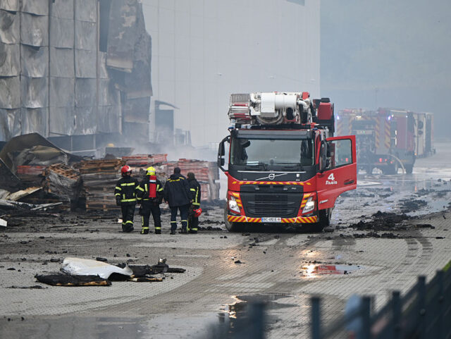 Russian attack causes fire at Lviv industrial park Firefighters stay by fire engines during a response effort to a fire at an industrial park