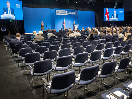 Empty seats in the auditorium as shadow chancellor Sir Mel Stride makes a speech during th