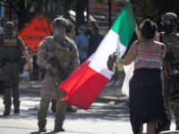 Federal Agents Ambushed in Chicago-Area in Coordinated Act of Domestic Terrorism; Armed Suspect Sho