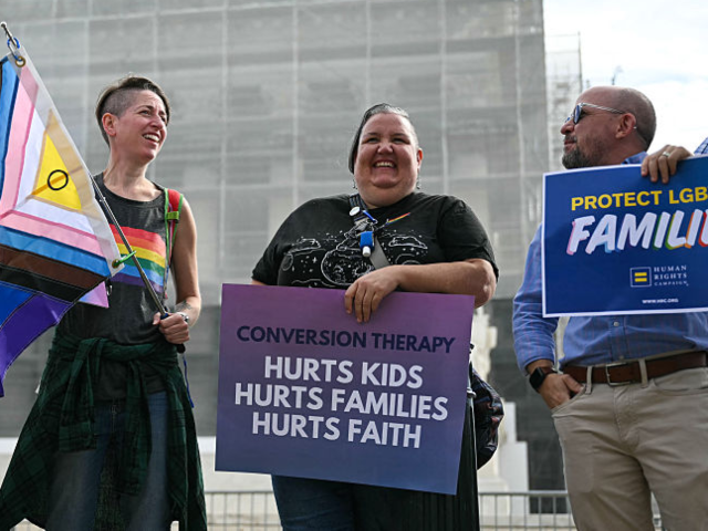 Demonstrators protest against conversion therapy outside the US Supreme Court as the Court