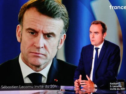 This photograph shows a television screen displaying France's outgoing Prime Minister Seba