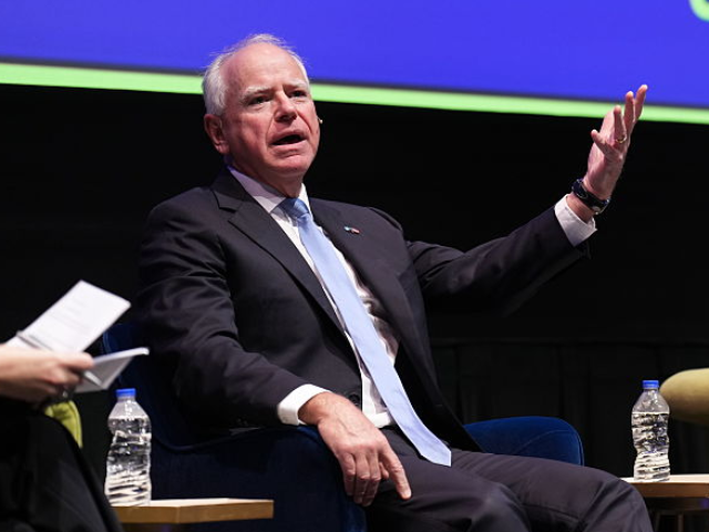 GettyImages-2240006801 MINNEAPOLIS, MN. - OCTOBER 2025: Minnesota Gov. Tim Walz, left, and Illinois Governor JB P