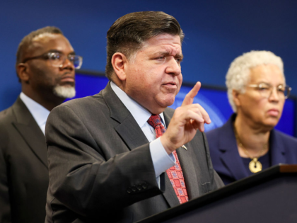 Illinois Gov. JB Pritzker answers questions during a news conference about the current sta