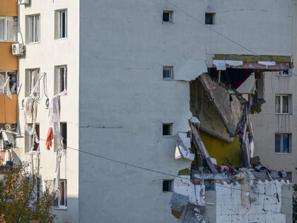 A partially destroyed block of flats ware seen after an explosion in Bucharest, Romania on