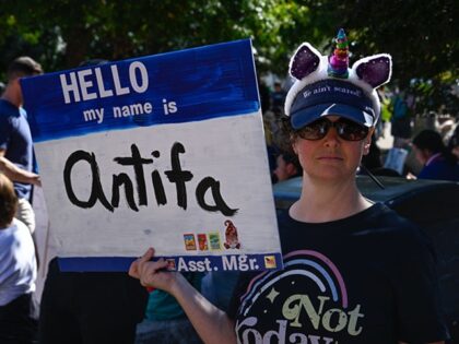CHARLOTTE, USA - OCTOBER 18: Protesters of an estimated 8,000 gather for a ''No Kings'' de