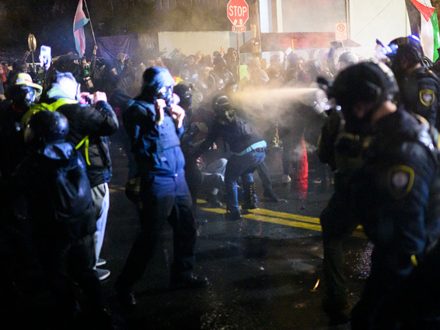 GettyImages-2241666609 PORTLAND, OREGON - OCTOBER 18: Anti-I.C.E. protesters clash with federal agents at the U.S