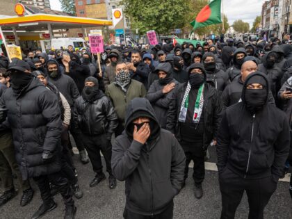 LONDON, ENGLAND - OCTOBER 25: Members of the Bangladeshi community mobilise to oppose a th