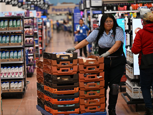 GettyImages-2243313197 An employee moves bread packs at a Walmart store in Mexico City on October 27, 2025. (Phot