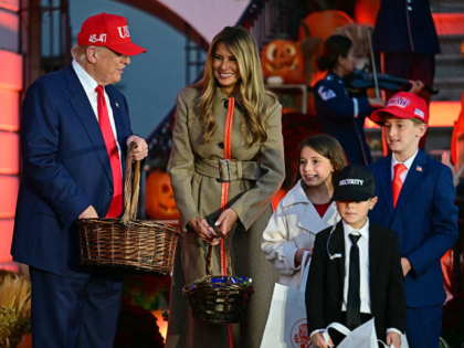 US President Donald Trump and US First Lady Melania Trump greet kids dressed as US Preside