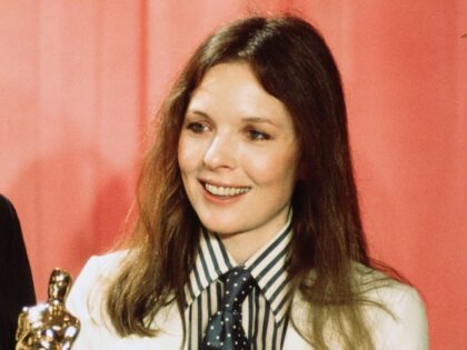 Director Milos Forman pose backstage after winning "Best Director" for "One Flew Over the