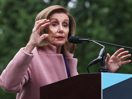 Rep. Nancy Pelosi (D-CA) speaks during a rally opposing House Republicans Tax Proposal pri