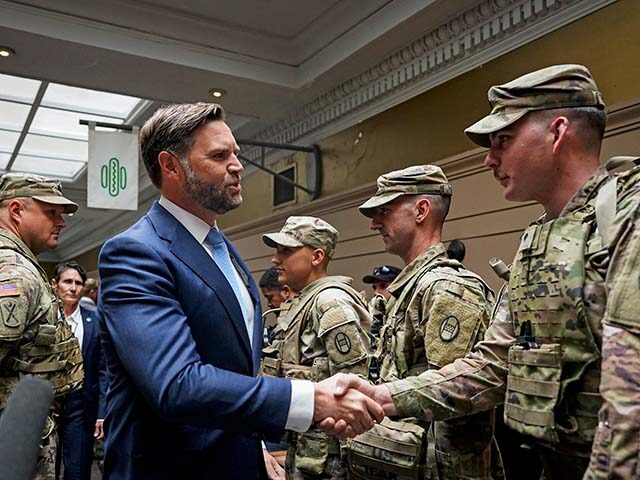 GettyImages2230417587 U.S. Vice President JD Vance greets members of the National Guard during a visit to Union