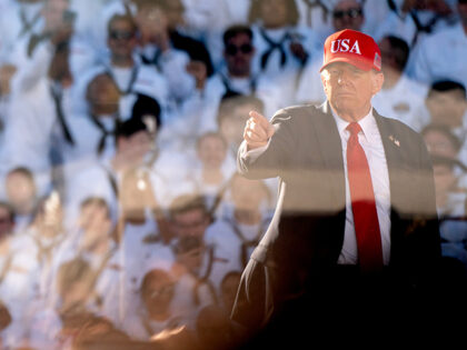 US President Donald Trump departs after speaking during an America 250 celebration for the
