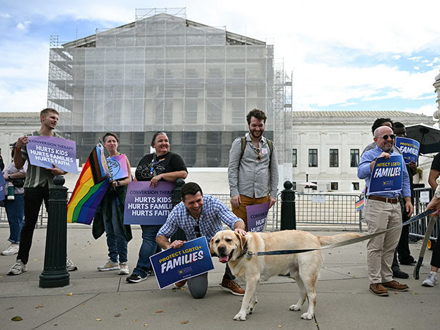 GettyImages2239324936 Demonstrators protest against conversion therapy outside the US Supreme Court as the Court