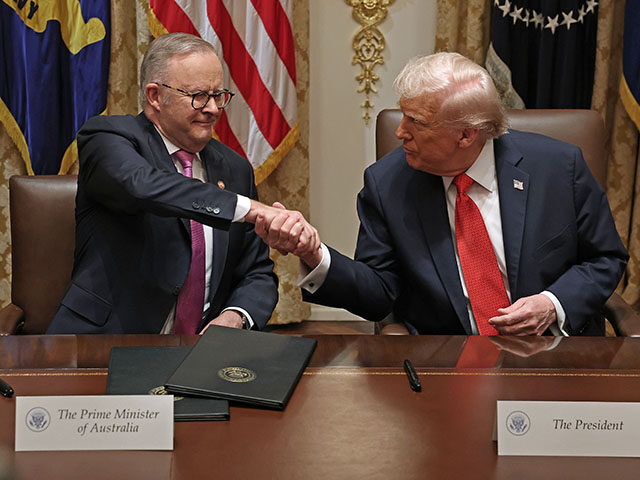 GettyImages2242208364 Prime Minister of Australia Anthony Albanese (L) and U.S. President Donald Trump shake han