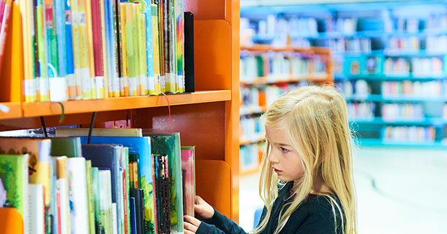 Ex-Librarian Accused of Promoting Porn in Children's Books Wins Settlement