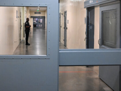 DENVER, COLORADO - OCTOBER 13: A Denver Sheriff's Department deputy stands guard in t