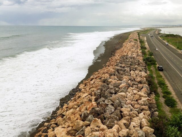 Hurricane Melissa This aerial view shows storm surge crashing into the seawall that protects Palisadoes Stri
