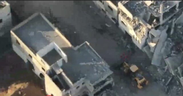 WATCH: Hamas Buries Human Remains, then Pretends to Retrieve Body