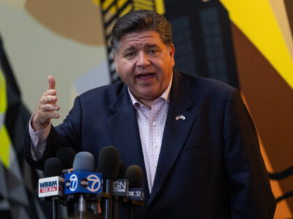 llinois Governor JB Pritzker speaks to the press following a visit to Metropolitan Peace A