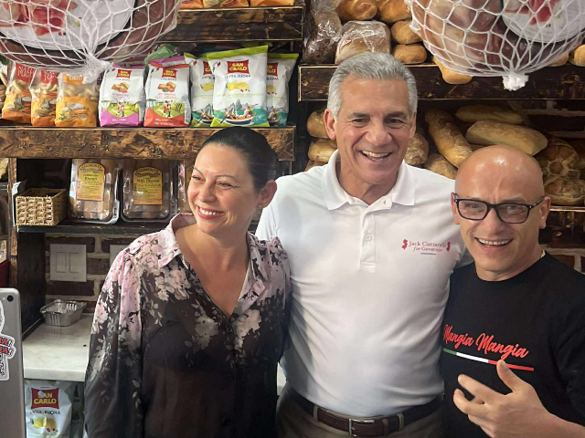 Republican gubernatorial candidate Jack Ciattarelli (center) visits Cuomo & Sons Deli in N