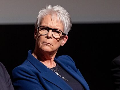 HOLLYWOOD, CALIFORNIA - SEPTEMBER 21: (L-R) Jason Blum and Jamie Lee Curtis speak onstage