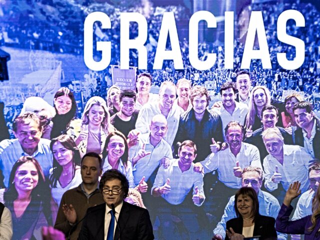 Javier Milei, Argentina's president, center left, speaks during a Libertad Avanza election