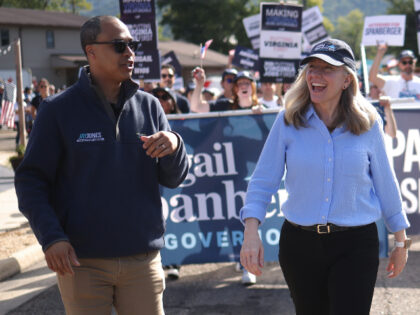 Virginia Democratic gubernatorial candidate, former Rep. Abigail Spanberger (C), marches i