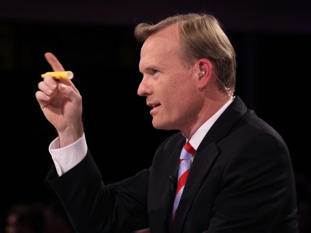 <> on November 14, 2015 in Des Moines, Iowa. DES MOINES, IA - NOVEMBER 14: "Face the Nation" anchor John Dickerson speaks prior to a pr