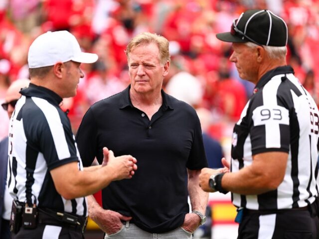 Kevin Sabitus_Getty Images (29) Commissioner of the NFL Roger Goodell speaks with referees prior to an NFL regular season