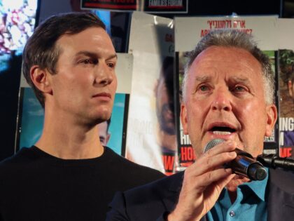 US special envoy Steve Witkoff (C) speaks as US businessman Jared Kushner (L) and his wife