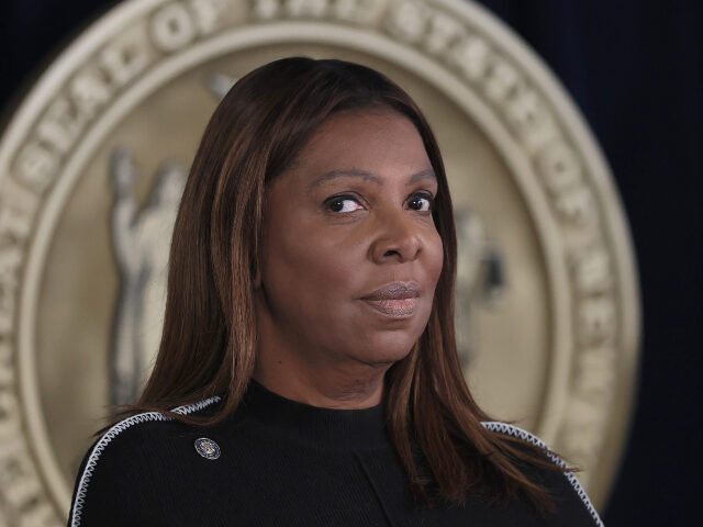 Attorney General Letitia James listens as New York Gov. Kathy Hochul speaks during a press