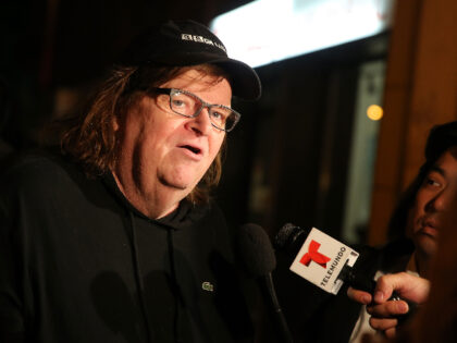 attends the premiere of documentary "Michael Moore In TrumpLand" at the IFC Cent
