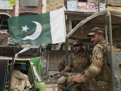Pakistan army troops patrol to ensure security near the Shiite Muslims attending Muharram