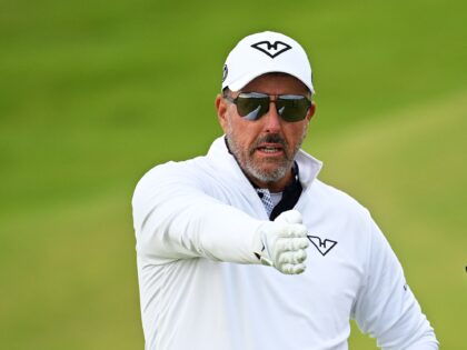 PORTRUSH, NORTHERN IRELAND - JULY 17: Phil Mickelson of the United States and his caddie p