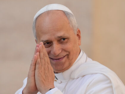 Pope Leo XIV gestures as he arrives for his weekly general audience in St. Peter's Sq