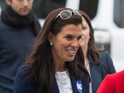 MANCHESTER, NH - JANUARY 08: Screenwriter and actress Lena Dunham, right, walks with Ports