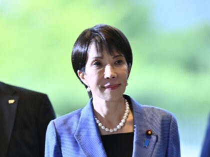Newly elected Japanese Prime Minister Sanae Takaichi arrives at her official residence in