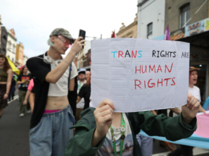 Activists and advocates participating in a Trans Day of Visibility march along King Street