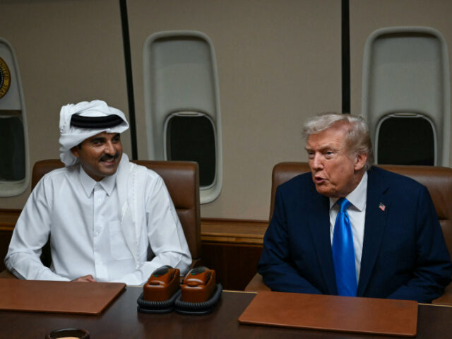 Trump and Qatar Emir US President Donald Trump speaks with Qatar's Emir Sheikh Tamim bin Hamad Al-Thani (L