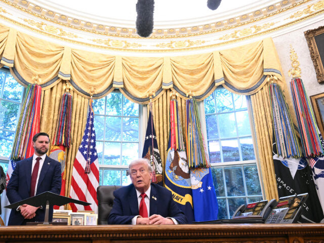 US President Donald Trump speaks to the press after signing an executive order about Tikto