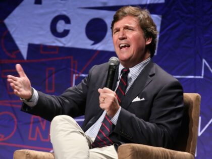 Tucker Carlson on stage